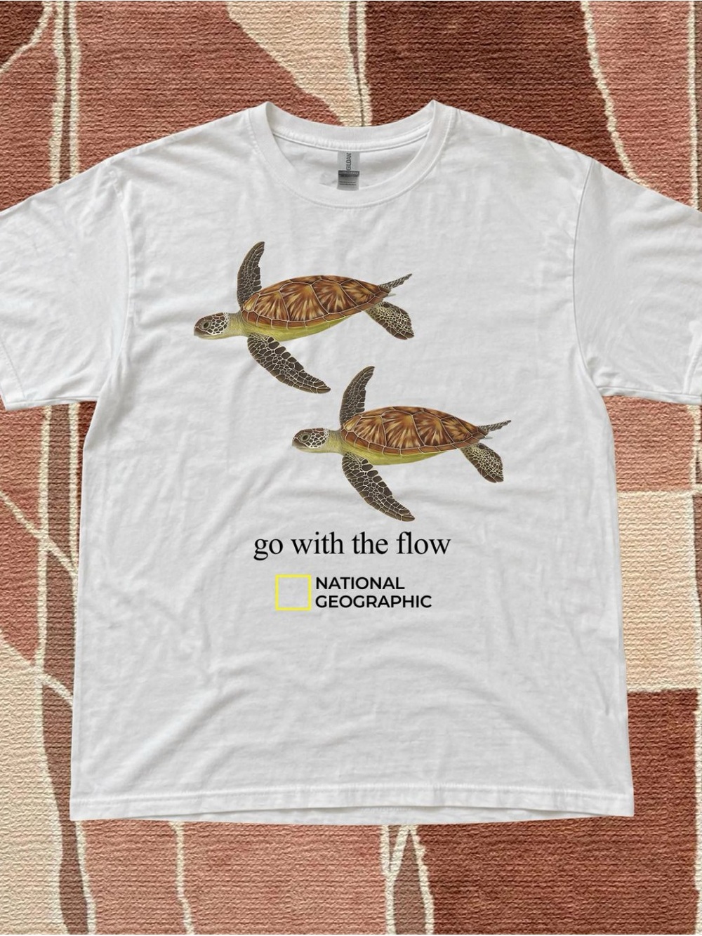 Gildan National Geographic White Tee with Sea Turtle Graphic - “Go With The Flow